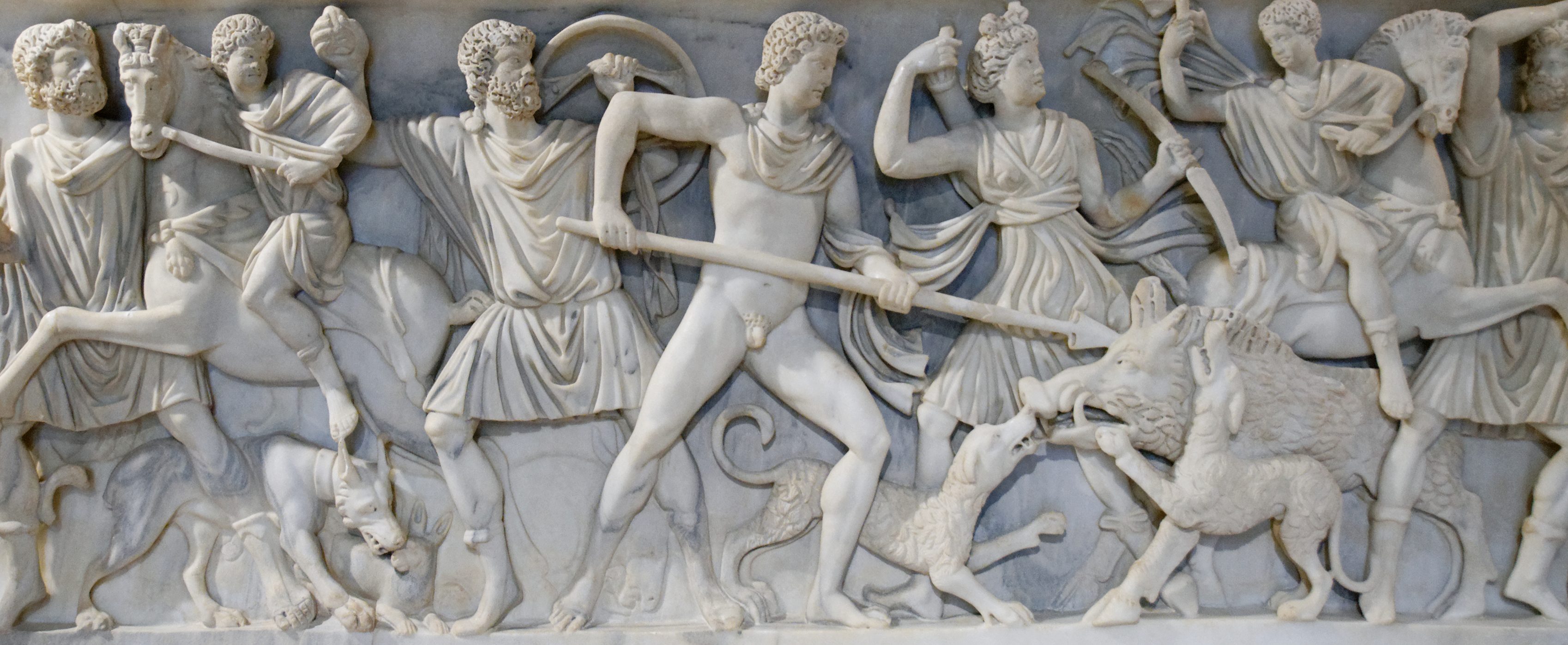 Proconnesian marble showing Prince Meleager spearing the Caledonian Boar with Atalanta next to him. There are two figures on horseback on either side of them as well as three assorted warriors. 